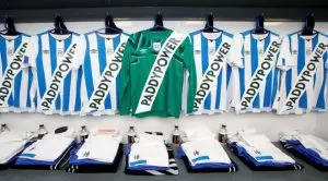 Huddersfield Town FC Claims It Displayed Large Paddy Power Logos on Shirts after Gambling Operator Threatened to Sue the Club